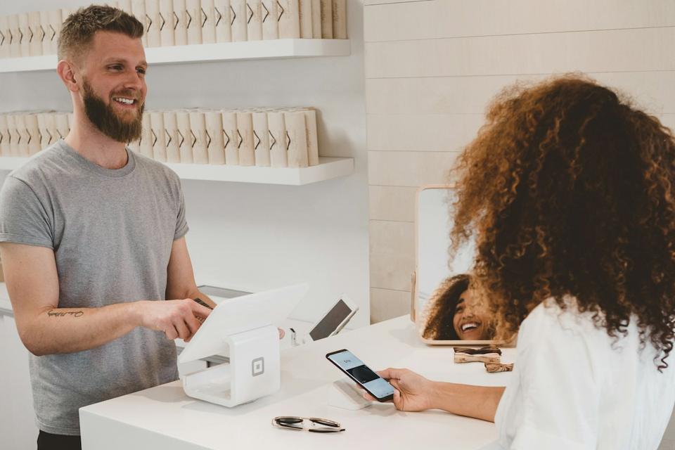 Customer being served at a shop counter
