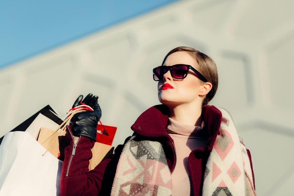 Shopper carrying shopping bags